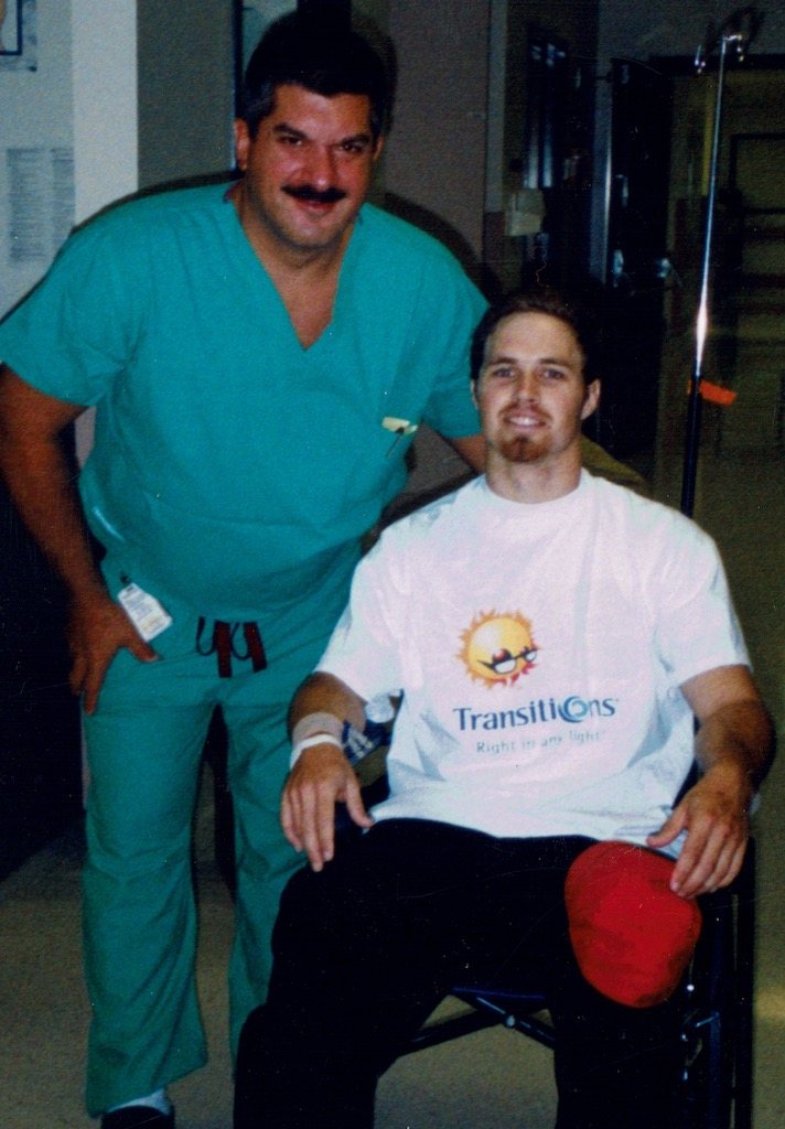 Brickman with a healthcare professional after recovery